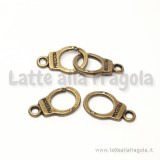 Charm manette in metallo color bronzo 17x10mm